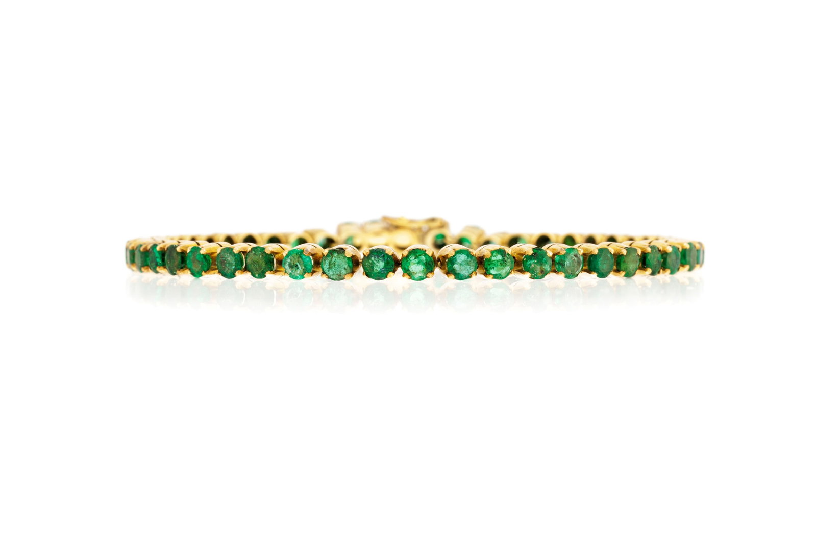 Bracelet rivière or 585 serti d'émeraudes taille rond, long. 17.5 cm, 8g: Bracelet rivière or 585 serti d'émeraudes taille rond, long. 17.5 cm, 8g Condition Etat bon à moyen. Nombreuses rayures à l'or. Fissures, égrisures et petits éclats aux