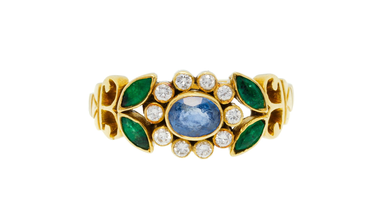 Bague or 750 sertie d'un saphir, de diamants et d'émeraudes formant un motif végétal,: Bague or 750 sertie d'un saphir, de diamants et d'émeraudes formant un motif végétal, doigt 57-17, 3g Condition Monture: Bon état de conservation général. Présence
