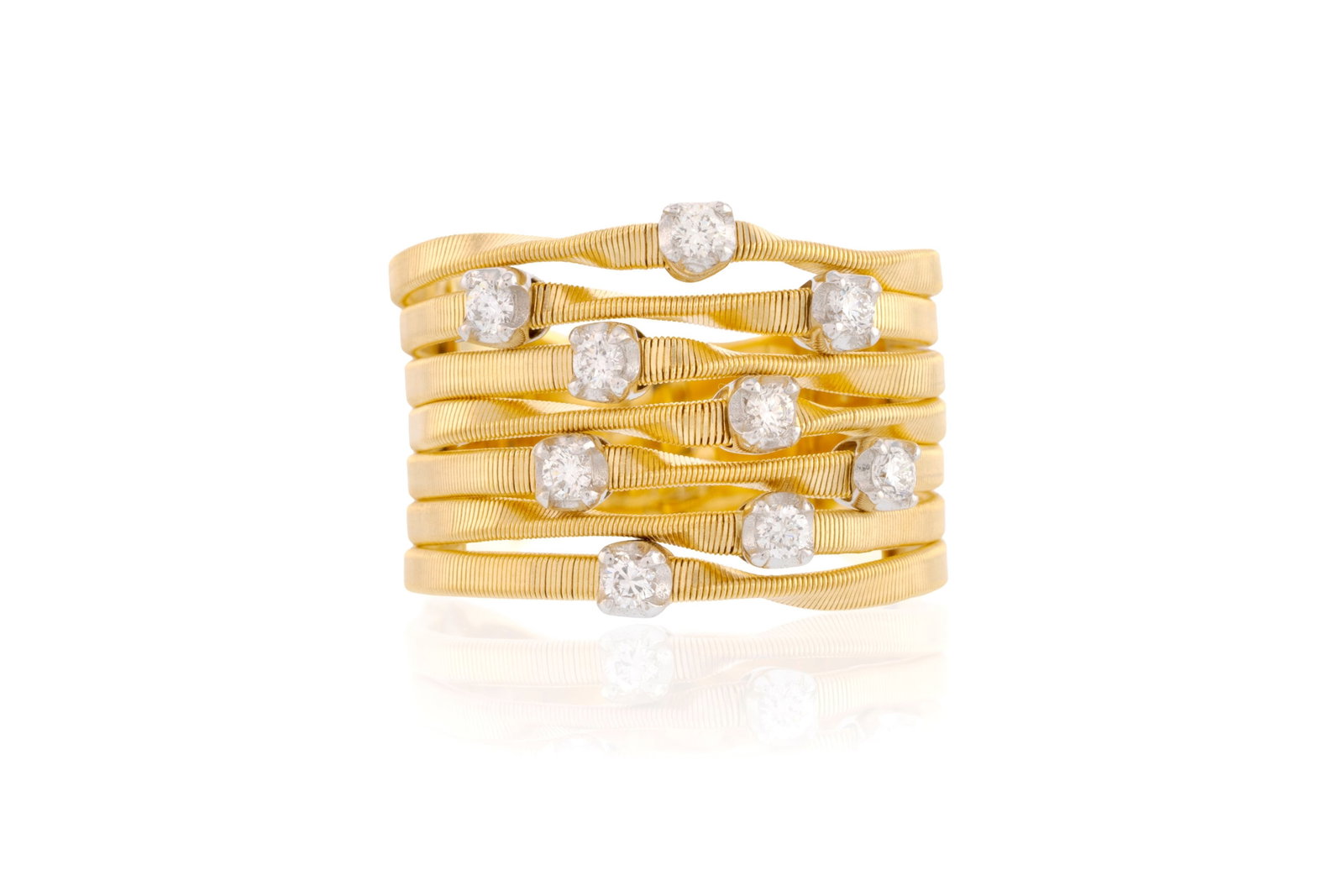 Marco Bicego, bague or 750 composée de bandeaux torsadés surmontés de diamants taille: Marco Bicego, bague or 750 composée de bandeaux torsadés surmontés de diamants taille brillant, signée, doigt 56-16, 11g Condition Bon état de conservation général.