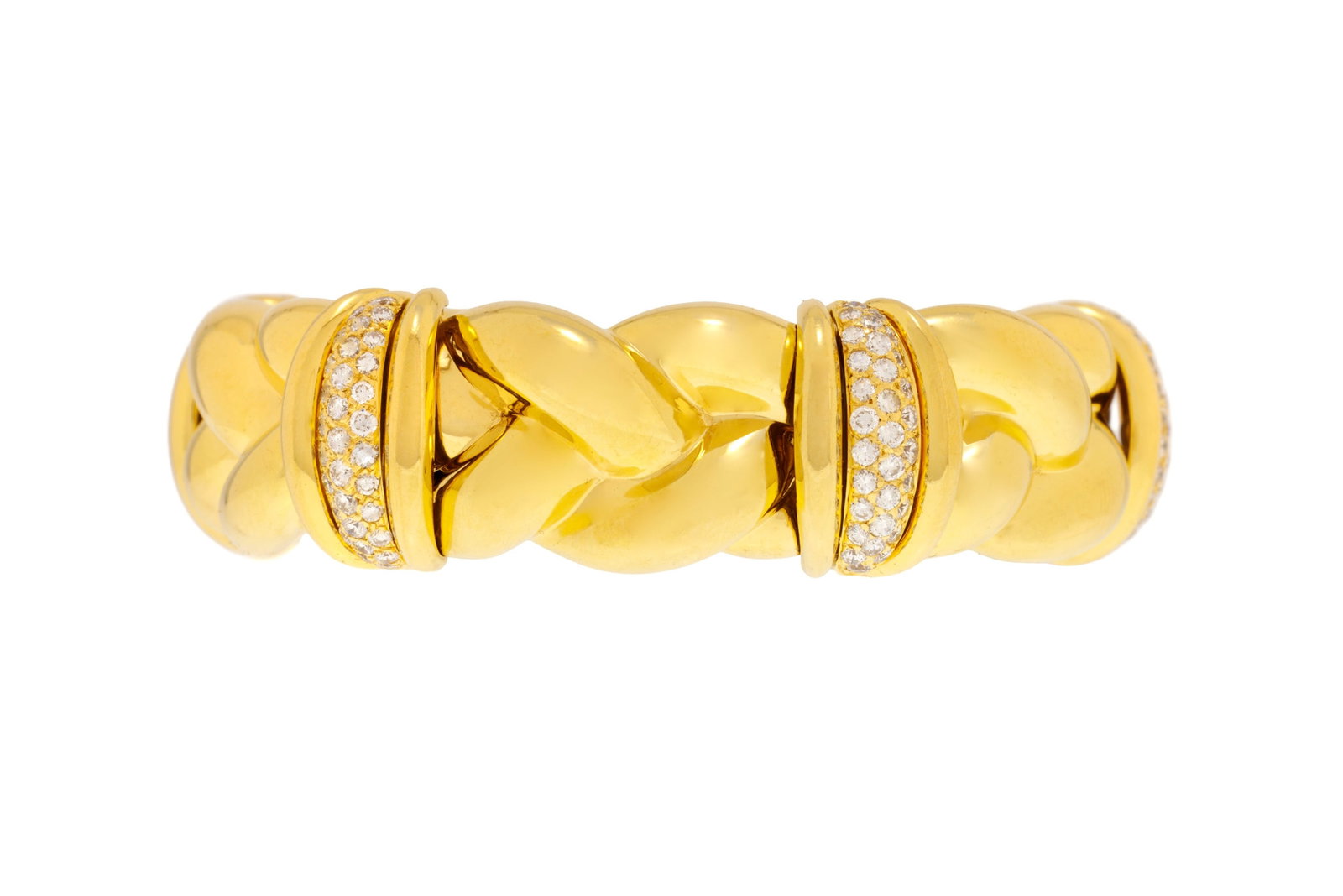 O.J. Perrin, bracelet semi-rigide or 750 effet tressé serti de diamants taille brillant, â: O.J. Perrin, bracelet semi-rigide or 750 effet tressé serti de diamants taille brillant, âme en acier, signé, circ. 15 cm, 74g, boîte Condition Bon état de conservation gé