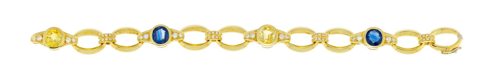 Bracelet or 750 à maillons ovales alternés d'éléments sertis de diamants taille : Bracelet or 750 à maillons ovales alternés d'éléments sertis de diamants taille brillant ainsi que de saphirs bleus et jaunes taille ovale, long. 18 cm, 30g Condition Monture: Bon