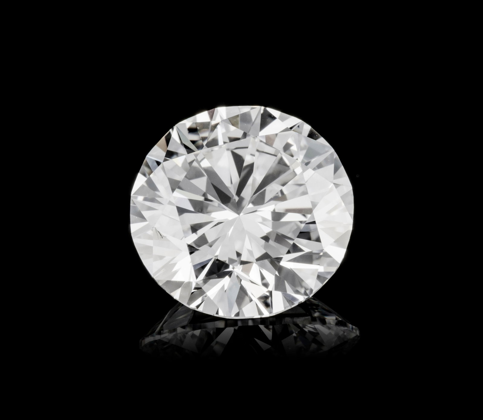 Un diamant taille brillant sur papier de 3.17 carats, E, FL selon le rapport GIA n°NY685404 dat: Un diamant taille brillant sur papier de 3.17 carats, E, FL selon le rapport GIA n°NY685404 daté du 16/12/1974 Condition Achat effectué chez Harry Winston S.A. of New York mars 1975
