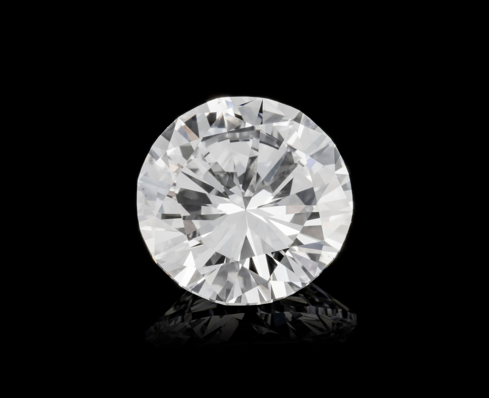 Un diamant taille brillant sur papier de 2.37 carats, E, FL selon le rapport GIA n°NY672734 dat: Un diamant taille brillant sur papier de 2.37 carats, E, FL selon le rapport GIA n°NY672734 daté du 30/08/1973 Condition Achat effectué chez Harry Winston S.A. of New York mars 1975