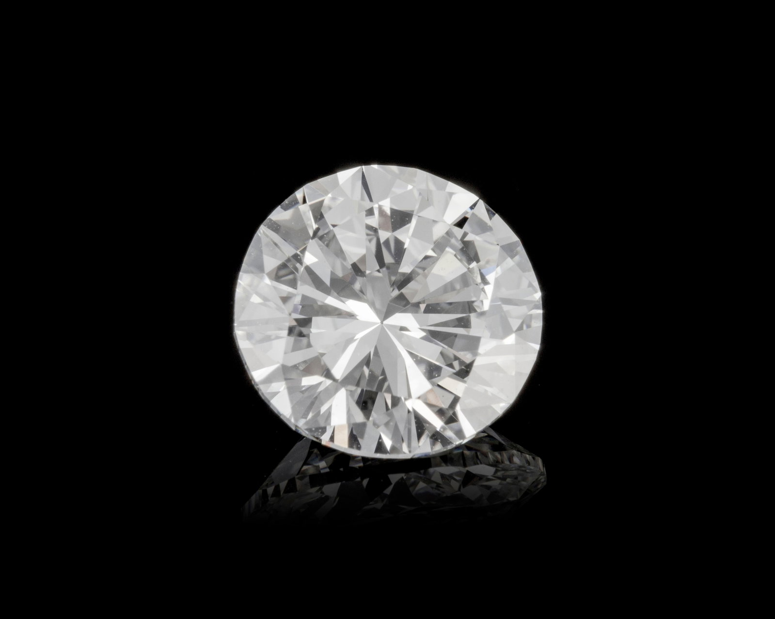 Un diamant taille brillant sur papier de 1.99 carat, E, IF selon le rapport GIA n°NY687000 dat&: Un diamant taille brillant sur papier de 1.99 carat, E, IF selon le rapport GIA n°NY687000 daté du 05/02/1975 Condition Achat effectué chez Harry Winston S.A. of New York mars 1975