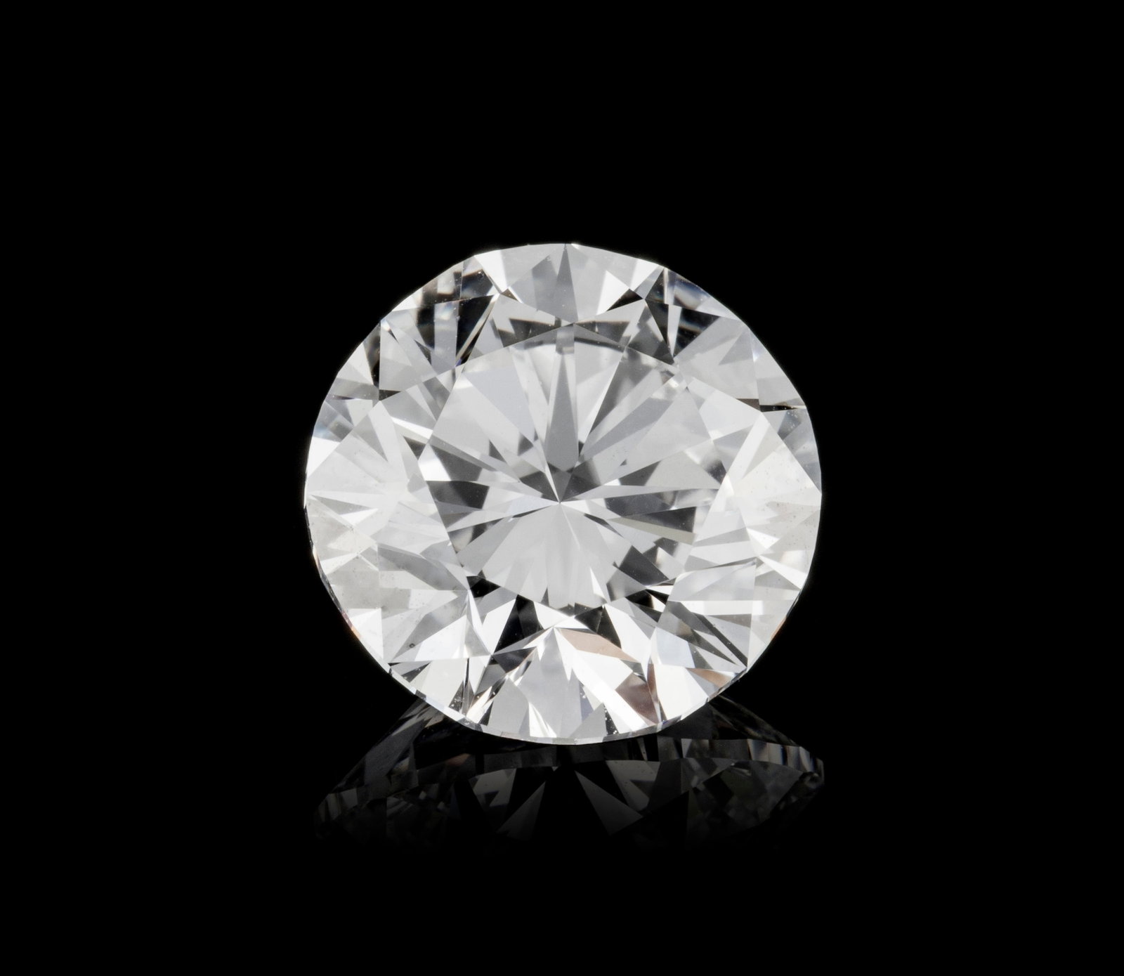 Un diamant taille brillant sur papier de 3.09 carats, E, FL selon le rapport GIA n°NY684354 dat: Un diamant taille brillant sur papier de 3.09 carats, E, FL selon le rapport GIA n°NY684354 daté du 18/11/1974 Condition Achat effectué chez Harry Winston S.A. of New York mars 1975