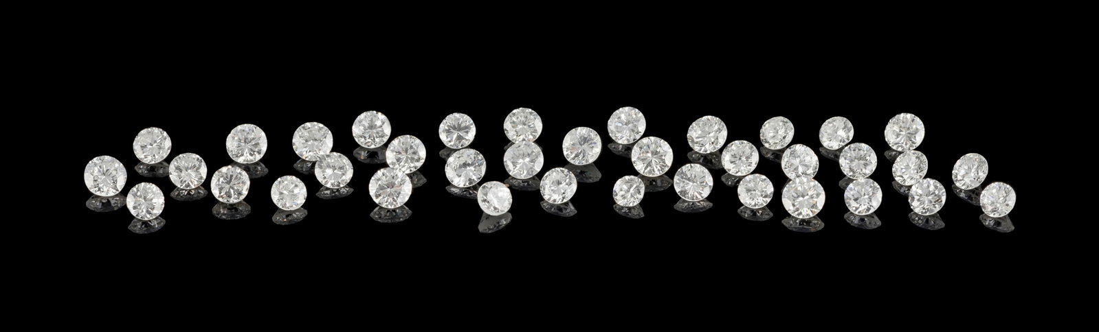 Lot de diamants taille brillant sur papier pour un total d'env. 4.99 carats: Lot de diamants taille brillant sur papier pour un total d'env. 4.99 carats