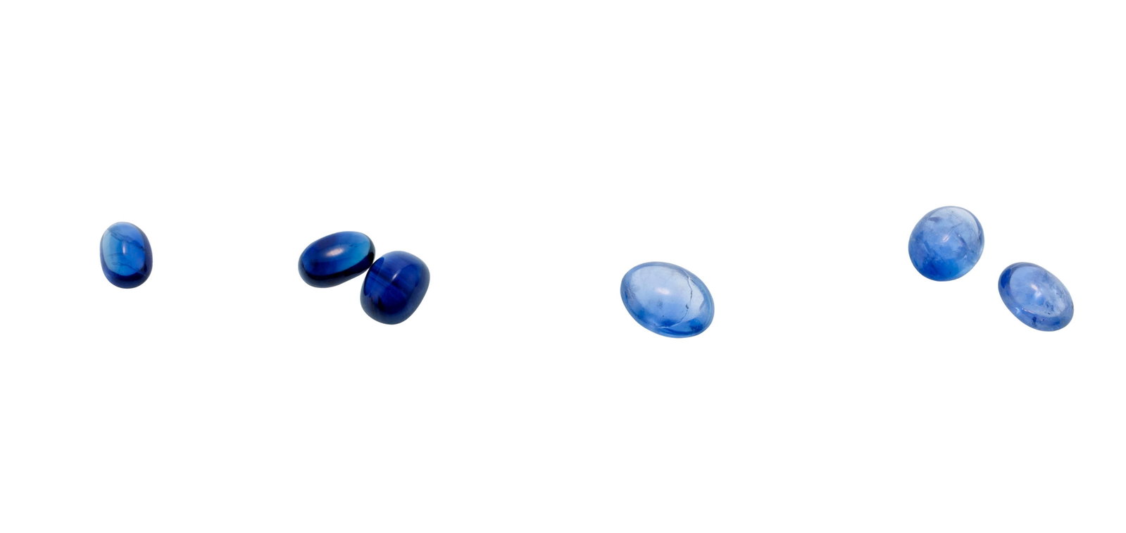 Un lot de saphirs taille cabochon sur papier pour un total de plus de 300 carats - 2