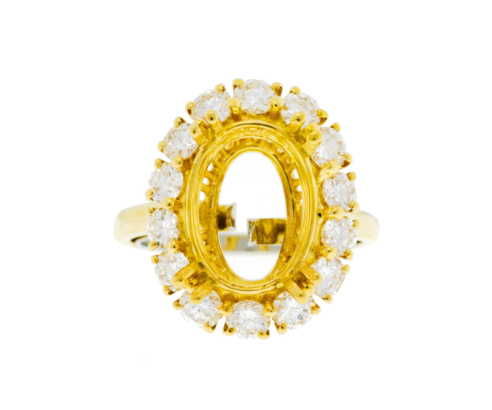 Monture de bague or 750 sertie de diamants taille brillant entourant un châton ovale vide, doig: Monture de bague or 750 sertie de diamants taille brillant entourant un châton ovale vide, doigt environ 50-10, 5g Condition Bon état de conservation général. Présence micro