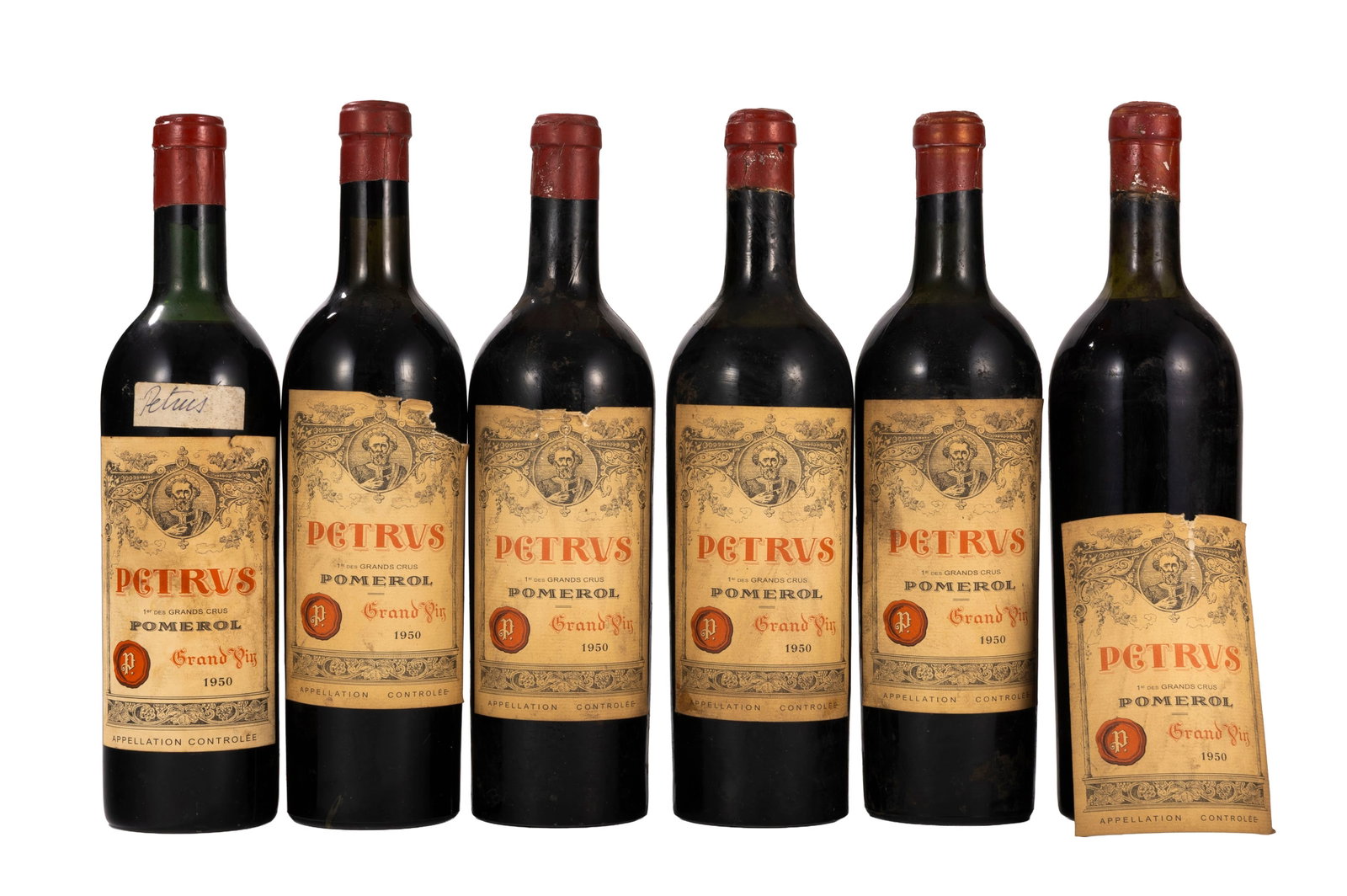 Petrus, 1950, Pomerol, 5 bts: Petrus, 1950, Pomerol, 5 bts Condition on joint une bt. présentant une fuite niveau: haut épaule à bas épaule une bouteille à l'étiquette décollée <