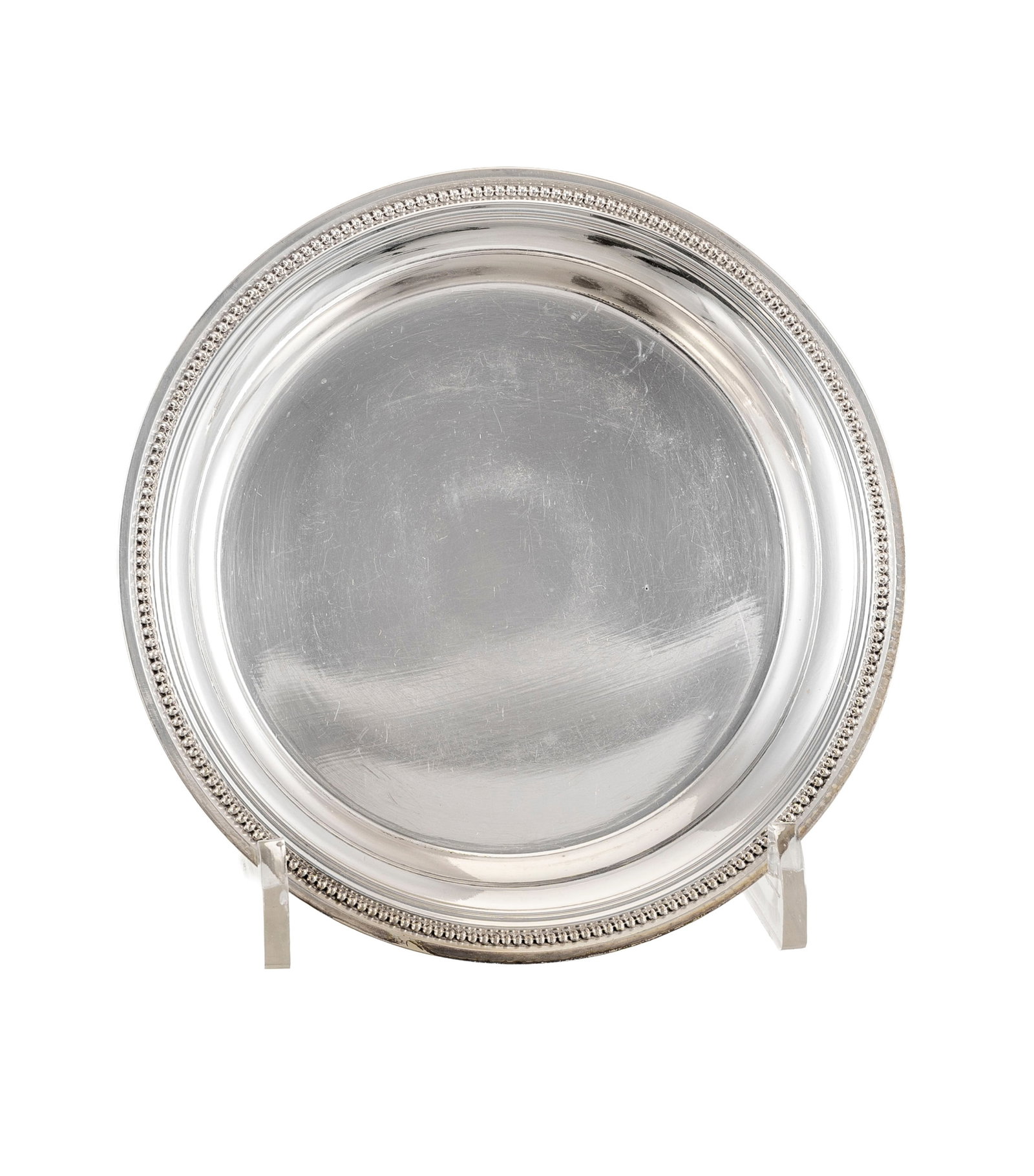 Christofle. Suite de 4 dessous de bouteille en métal argenté, à décor de perlett - 2