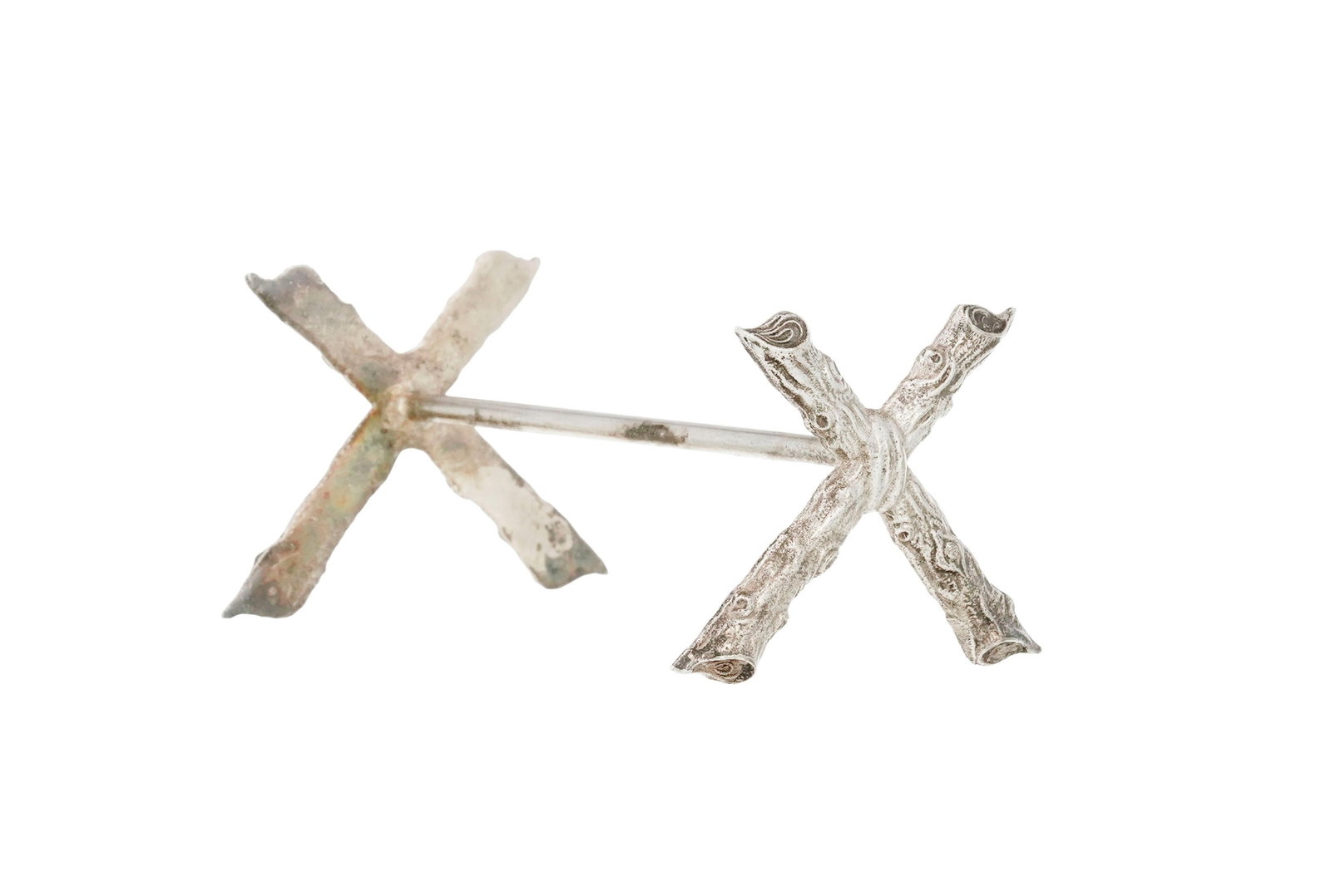 Suite de 12 porte-couteaux en métal argenté, XXe s., en forme de branches de bois, long. 7 - 2