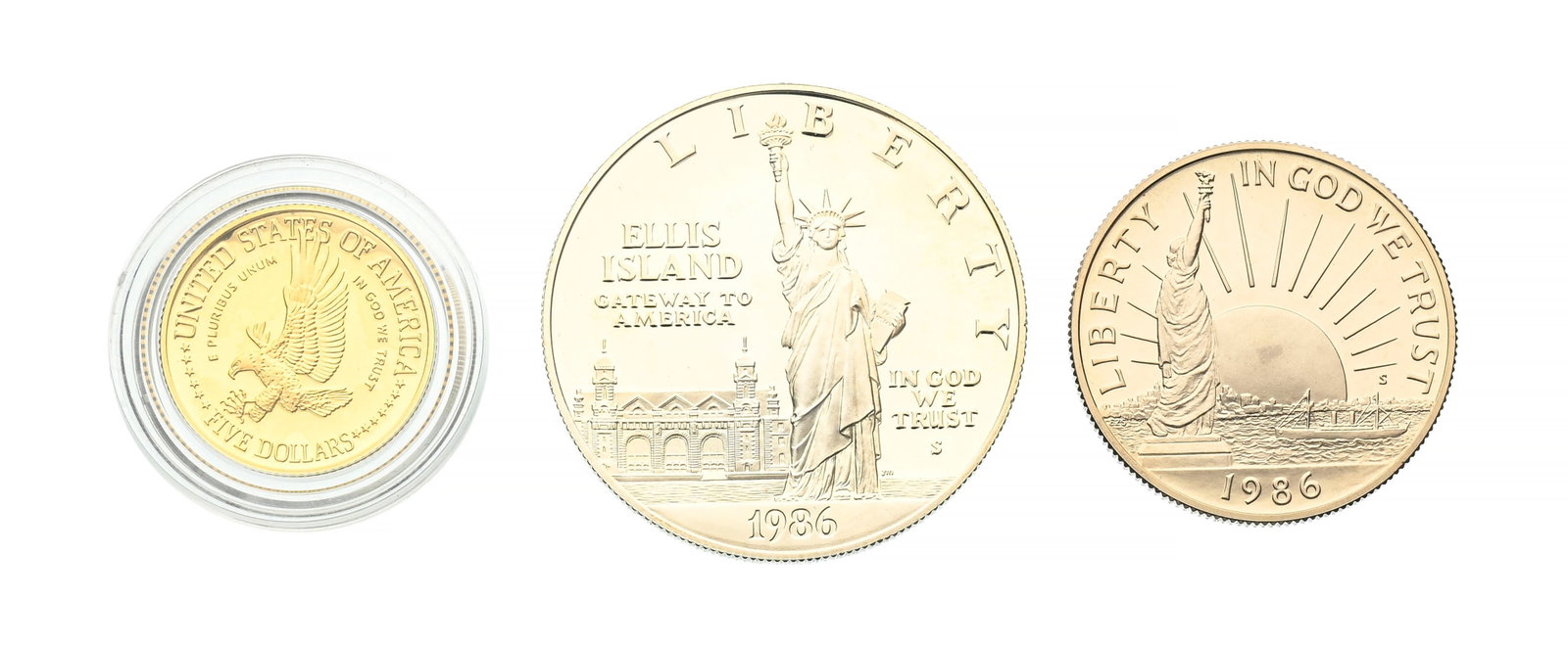 USA, coffret "Liberty coins" pour les 100 ans de la Statue de la Liberté, 1986, avec boîte: USA, coffret "Liberty coins" pour les 100 ans de la Statue de la Liberté, 1986, avec boîte et écrin originel, contient : - 5 dollars or, diam. 2,16 cm, 8,36 g. - 1 dollar argent, diam.