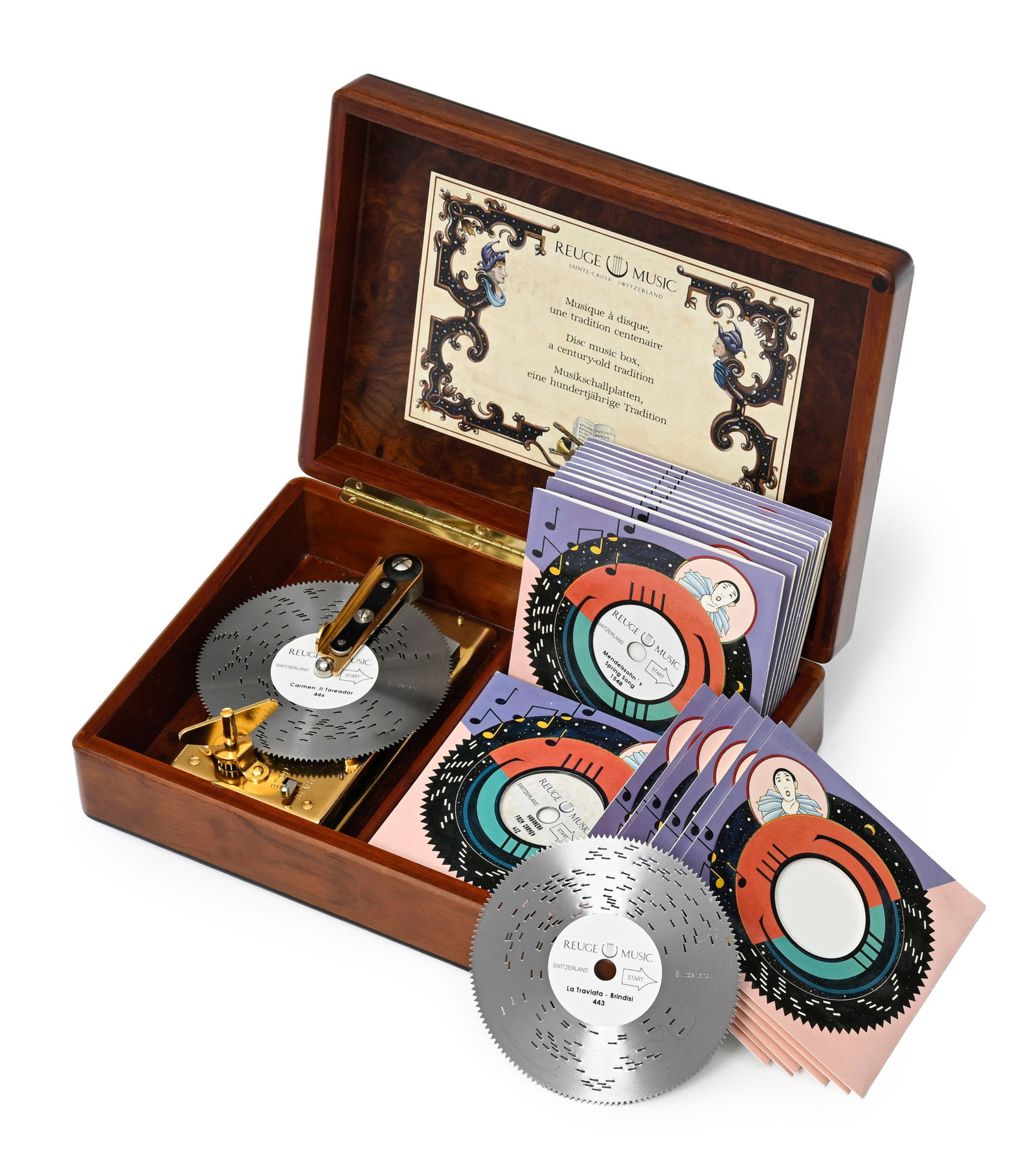 Reuge, boîte à musique à disques, en placage de loupe, avec 26 disques perforés,: Reuge, boîte à musique à disques, en placage de loupe, avec 26 disques perforés, housses en feutre, 27,5 x 19,5 x 7,5 cm