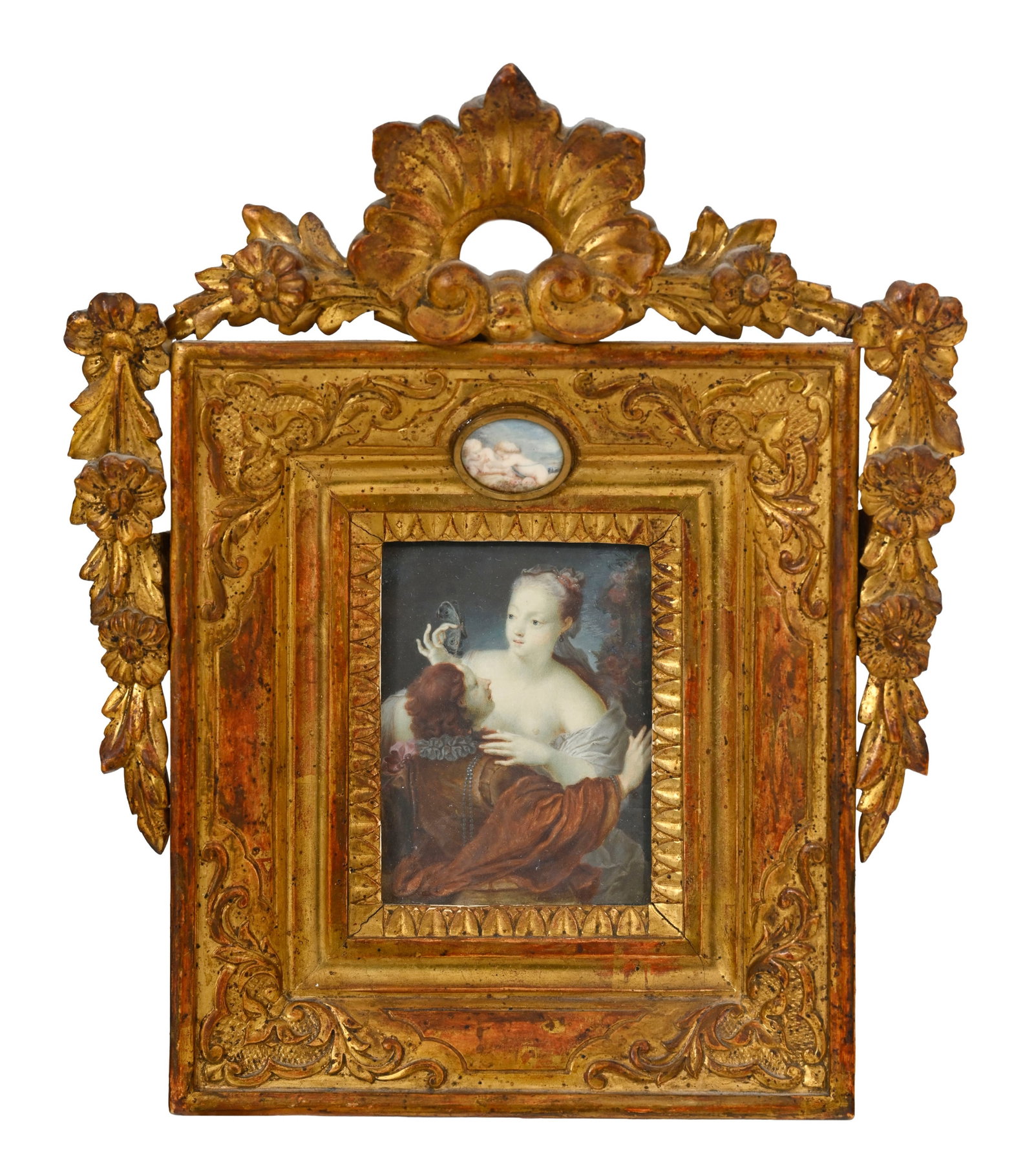 Un couple et le papillon, d'après Jacques Courtin, début XVIIIe s., copie en miniature du : Un couple et le papillon, d'après Jacques Courtin, début XVIIIe s., copie en miniature du XIXe s., le cadre inséré d'un miniature en médaillon, à vue 9x6,5 cm Provenance