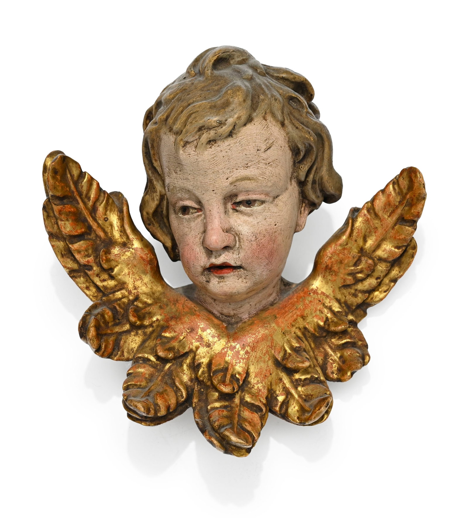 Tête d'angelot en bois polychrome avec ailes dorés, école Tyrolienne, XVIIIe s., 19x1: Tête d'angelot en bois polychrome avec ailes dorés, école Tyrolienne, XVIIIe s., 19x19 cm Provenance : Famille Schlote, Göttingen, Basse-Saxe ; collection du Dr Karl Schlote,