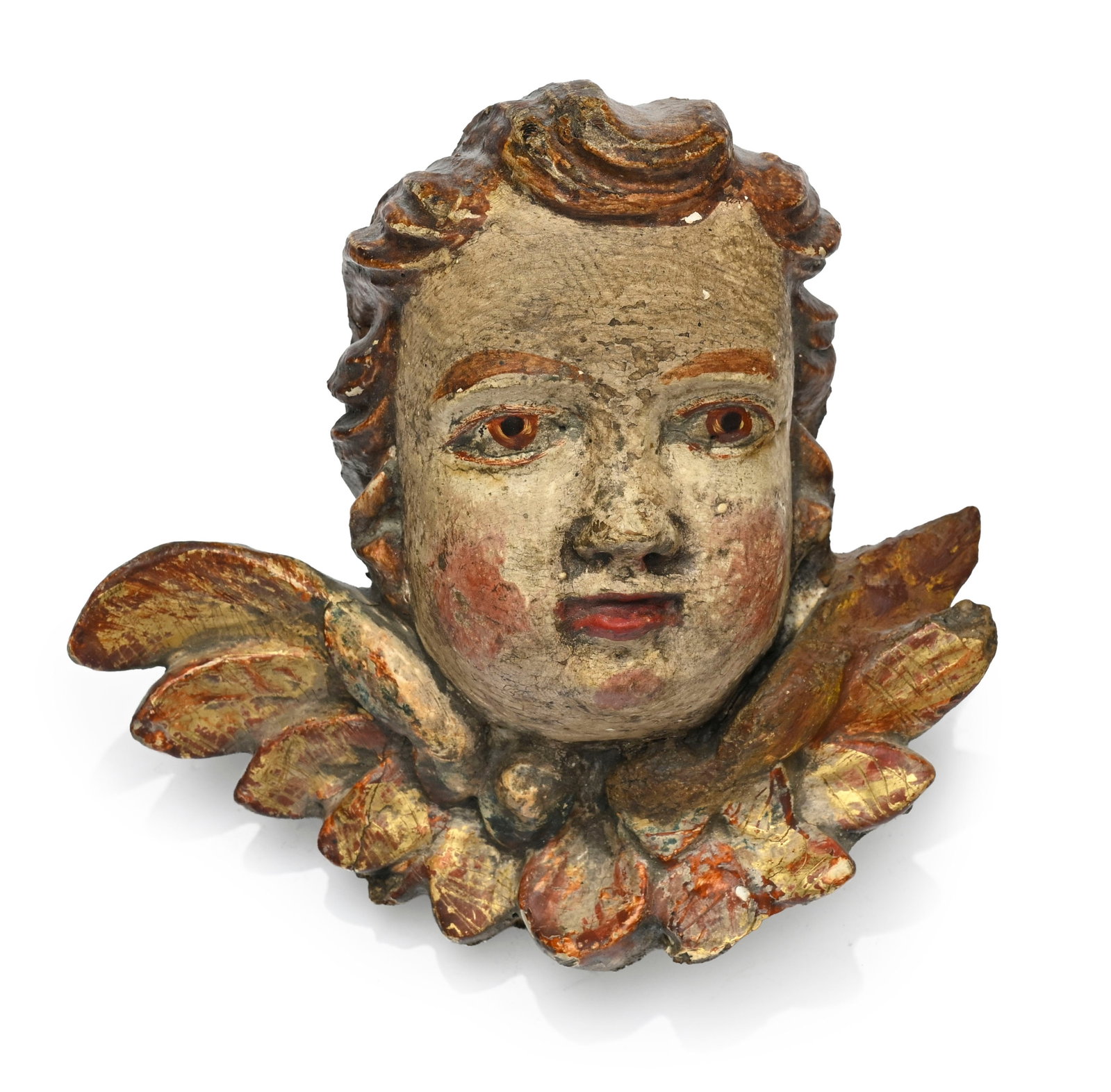 Tête d'angelot en bois polychrome, XVIIe - début XVIIIe s., 18,5x17 cm Provenance : Famil: Tête d'angelot en bois polychrome, XVIIe - début XVIIIe s., 18,5x17 cm Provenance : Famille Schlote, Göttingen, Basse-Saxe ; collection du Dr Karl Schlote, Eschwege, Hesse du Nord, cons
