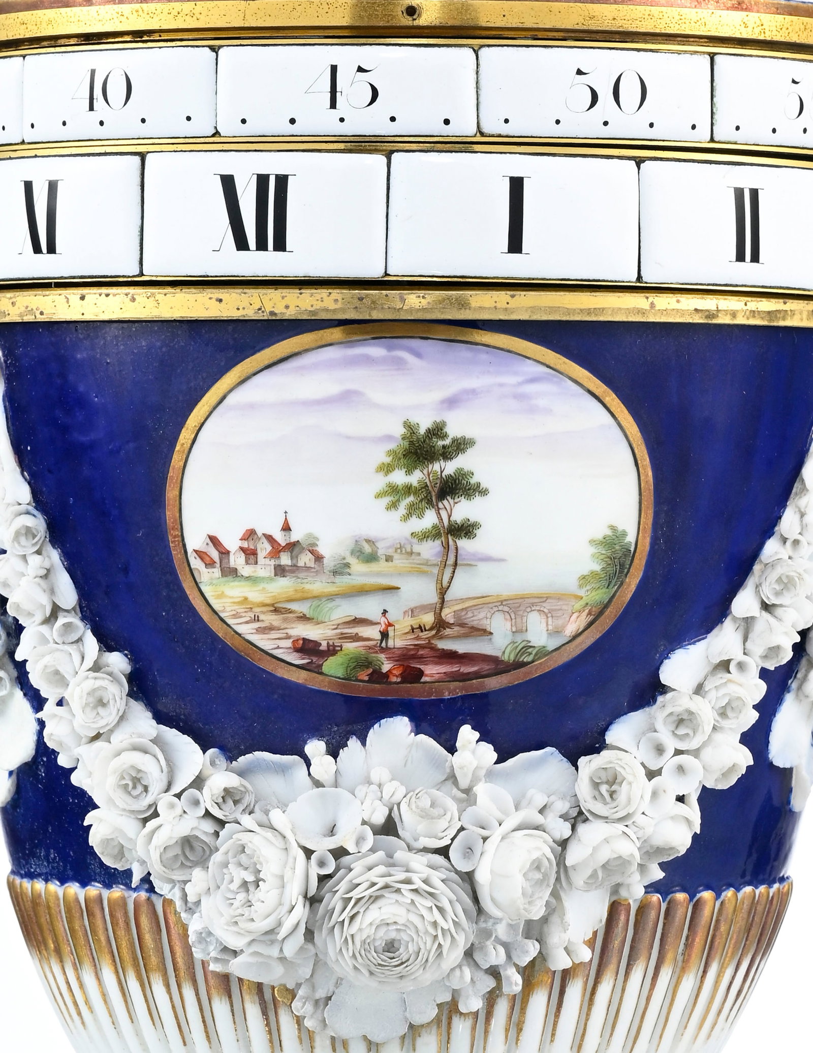 Pendule à cadrans tournants d'époque Louis XVI, en porcelaine à fond bleu de Nidervil - 11