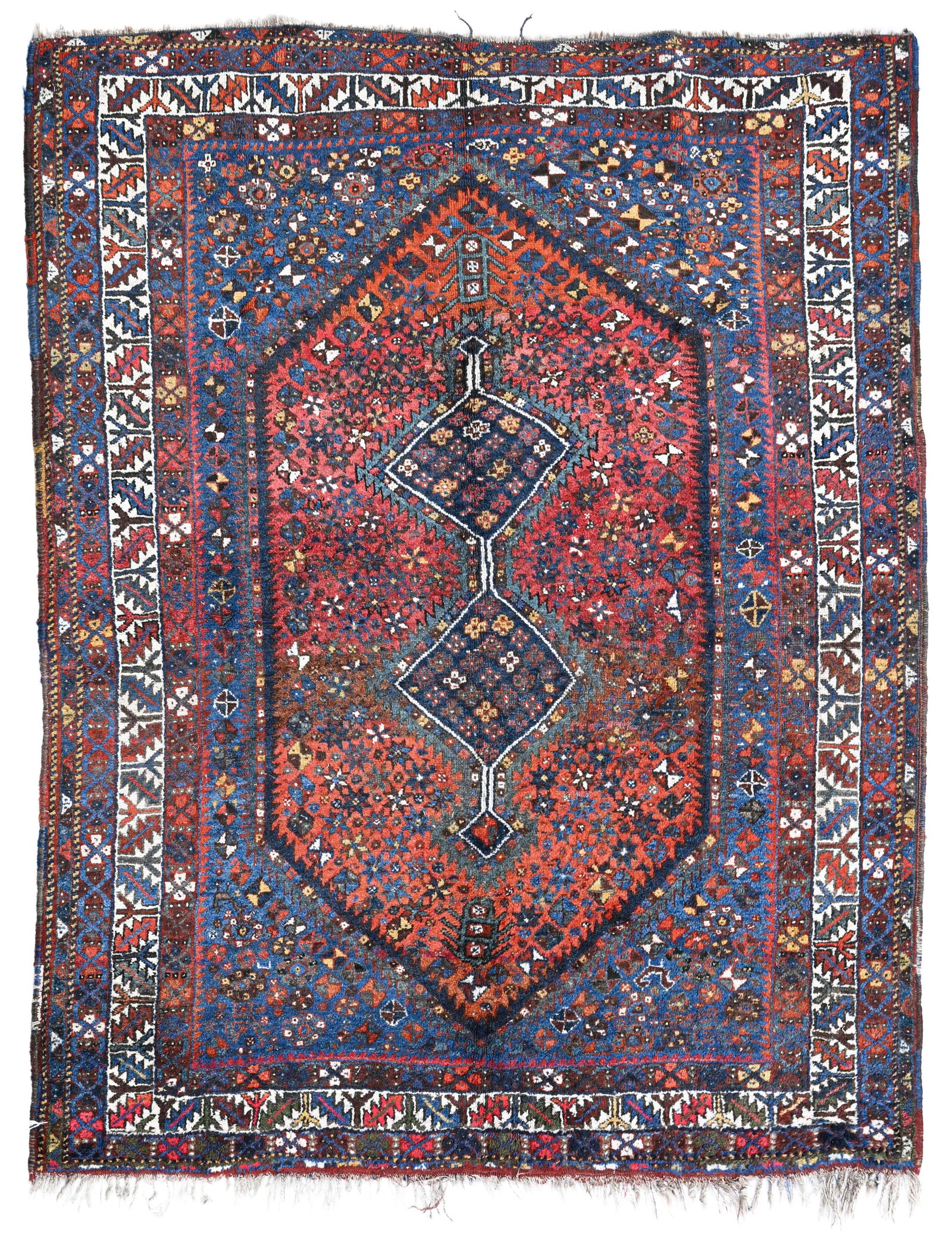 Tapis Gashgaï, Iran, 2ème moitié du XXe s., à deux losanges bleu marine inscrits: Tapis Gashgaï, Iran, 2ème moitié du XXe s., à deux losanges bleu marine inscrits dans un hexagone rouge fleuri, 162x207 cm