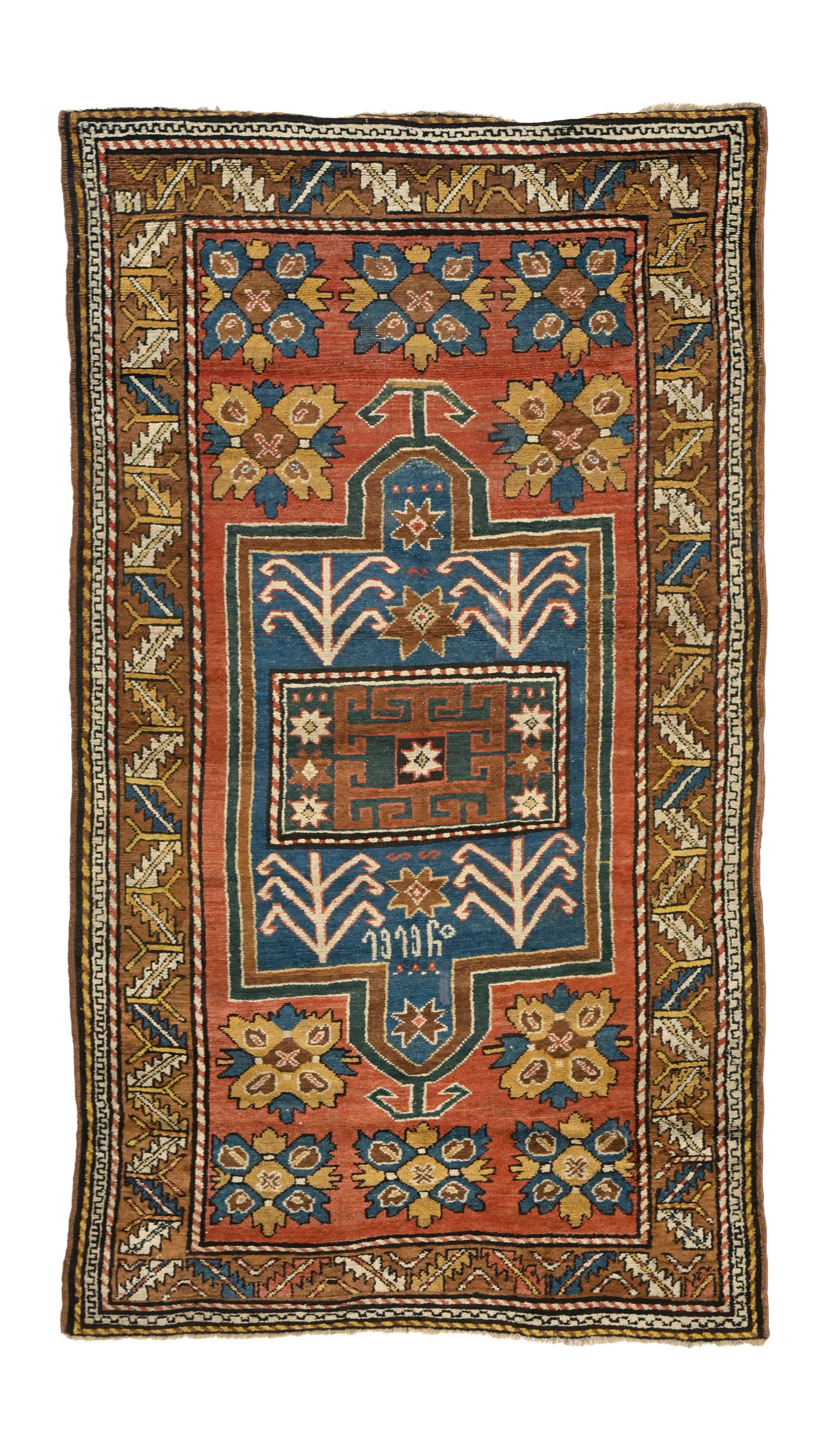 Tapis Kazakh, Caucase, 1er tiers du XXe s., à double mihrab central bleu sur fond rouge à : Tapis Kazakh, Caucase, 1er tiers du XXe s., à double mihrab central bleu sur fond rouge à semis de fleurs stylisées, bordure brune ornée d'une frise de feuilles stylisées,