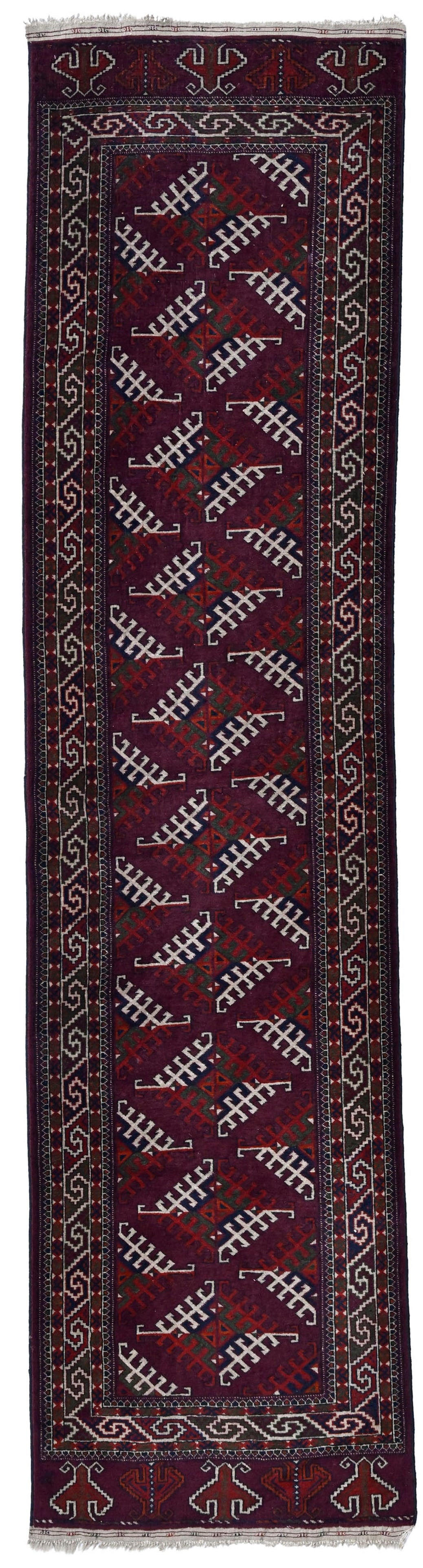 Tapis de passage Yomouth, Turkménistan, 2ème tiers du XXe s., à décor de gü: Tapis de passage Yomouth, Turkménistan, 2ème tiers du XXe s., à décor de güls sur fond rouge, bordure ornée de frises de motifs géométriques, 76x308 cm