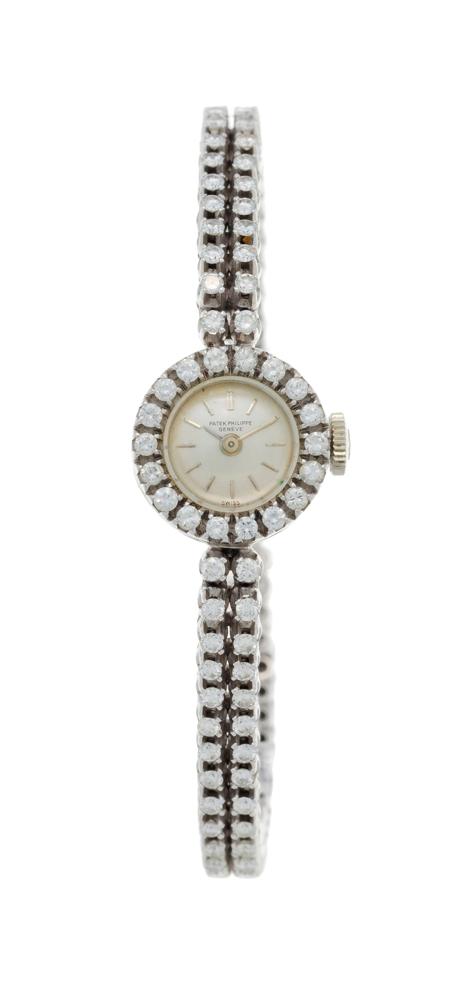 Patek Philippe, montre-bracelet en or gris 750 sertie de diamants Mouvement: cal. 13.5-320, mé: Patek Philippe, montre-bracelet en or gris 750 sertie de diamants Mouvement: cal. 13.5-320, mécanique, 20 rubis, n°981423 Boîtier: diam. 15 mm Signature: cadran, mouvement Accessoire: m