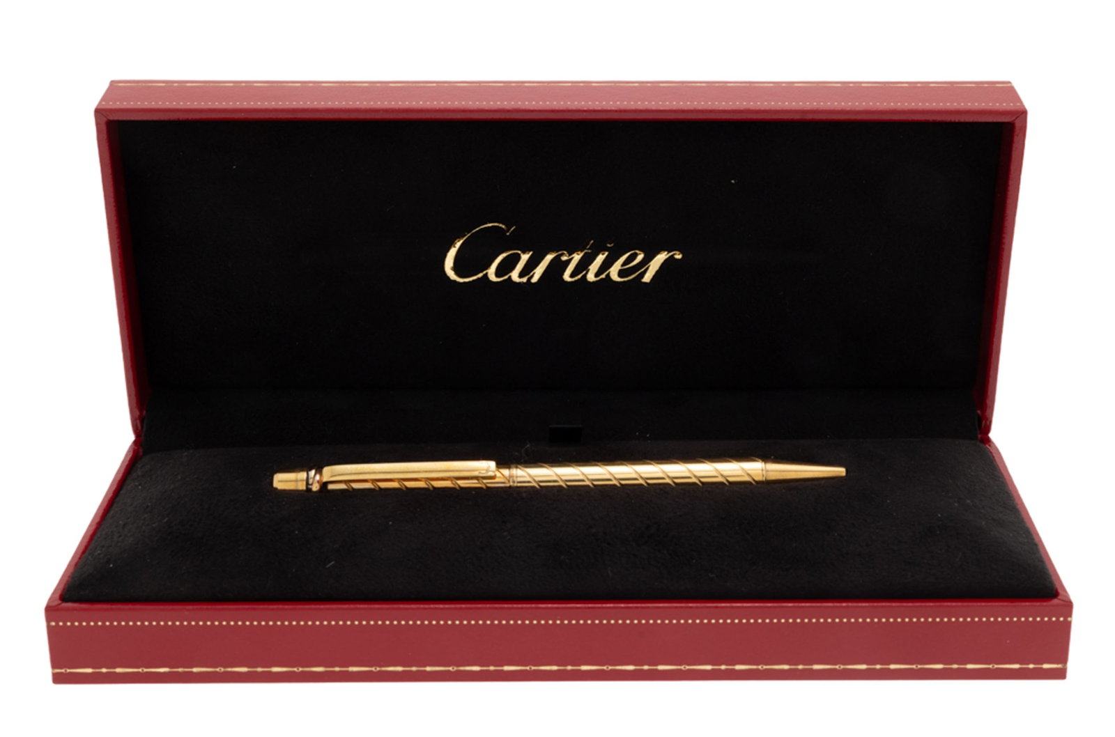 Cartier, stylo bille en or 750 rainuré, signé, numéroté 033, long. 10.7 cm, 31g, - 2