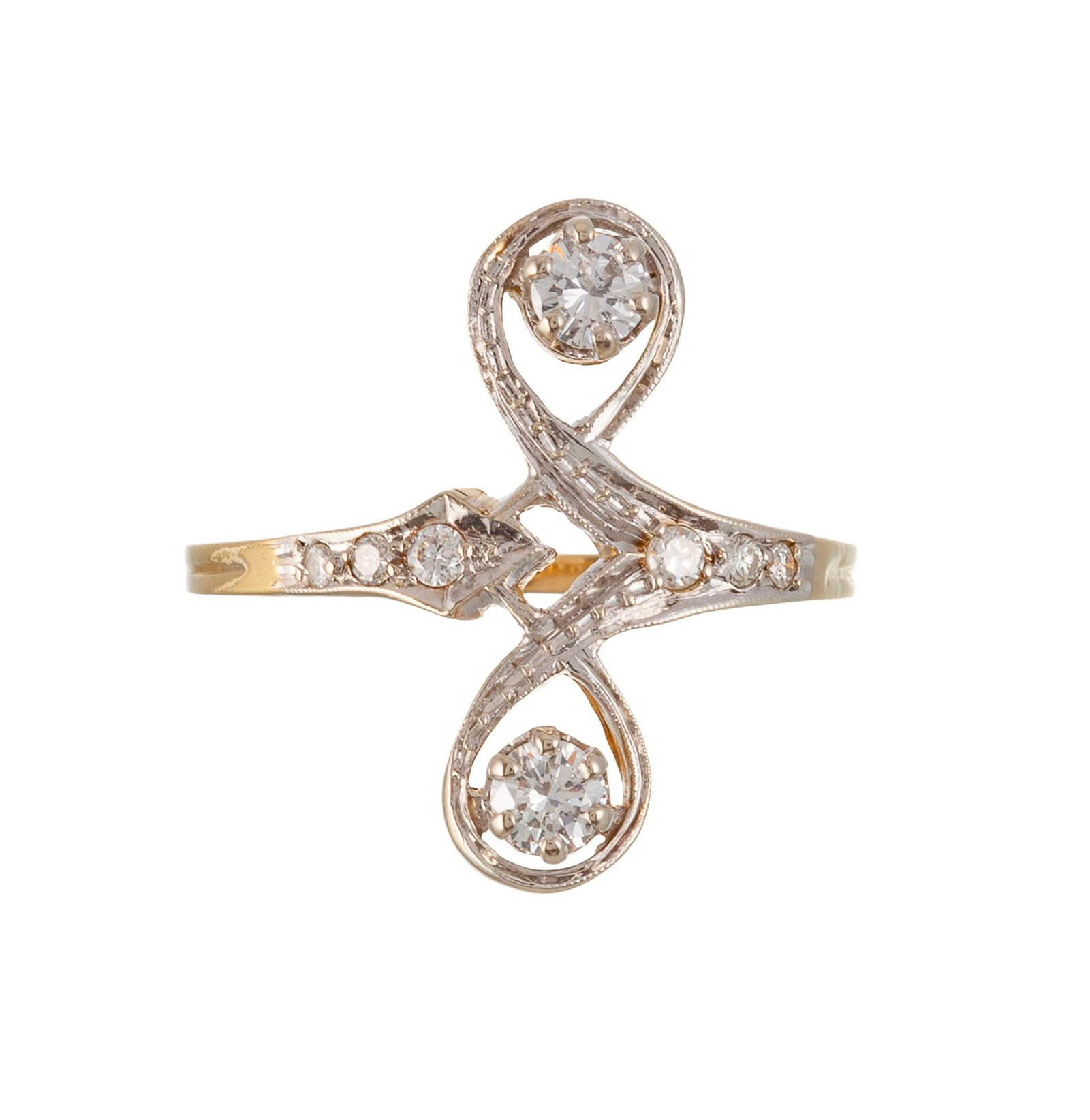 Bague 2 ors 750 sertie de diamants taille brillant dont deux plus importants se faisant face, doigt : Bague 2 ors 750 sertie de diamants taille brillant dont deux plus importants se faisant face, doigt 61-21, 4g Condition Très bon état de conservation général. Présence de