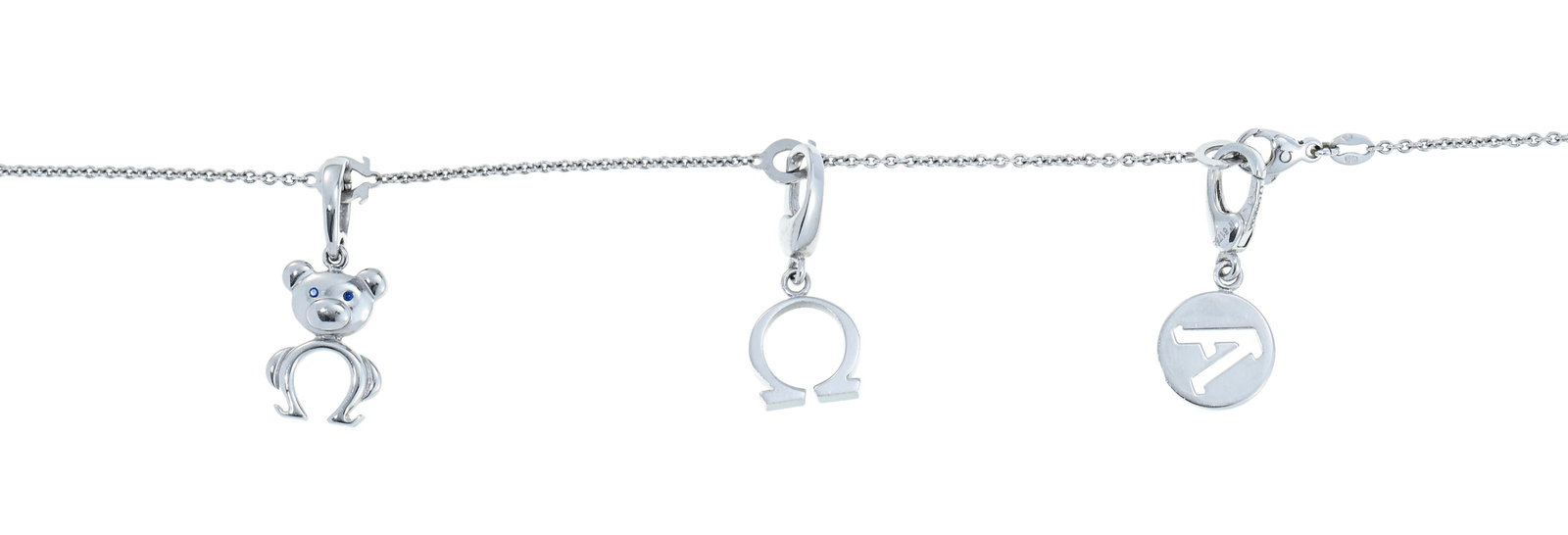Omega, sautoir composé de deux chaînes or gris 750 retenant trois charms amovibles : la le - 3
