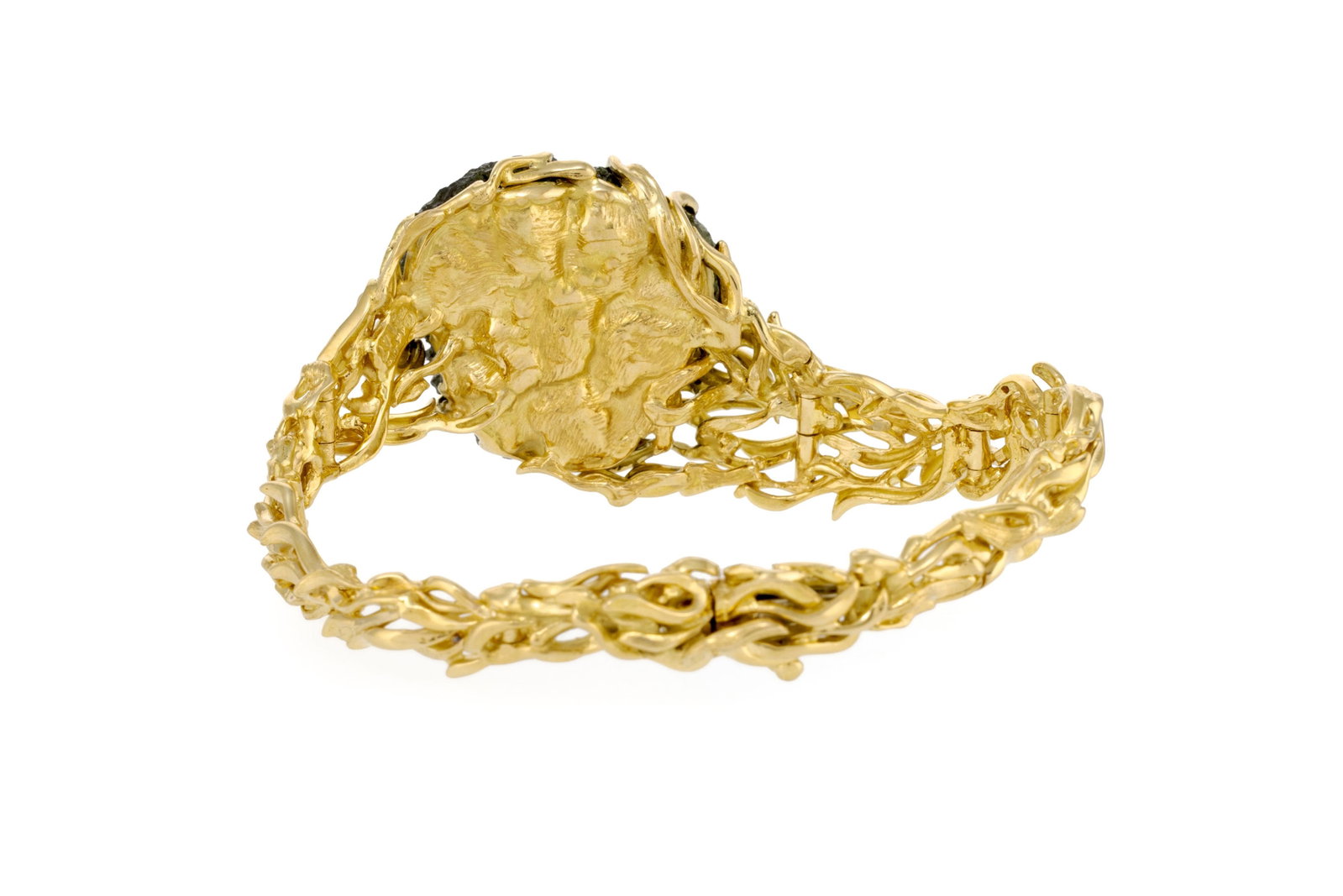 Gilbert Albert, bracelet semi rigide or 750 stylisant un motif végétal enserrant un morcea - 3