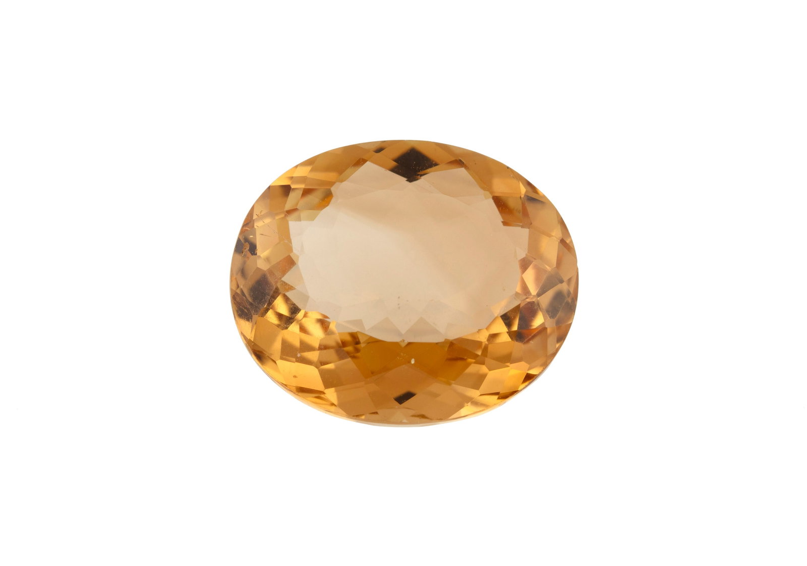Une topaze taille ovale couleur rose-orangé sur papier de 10.24 carats: Une topaze taille ovale couleur rose-orangé sur papier de 10.24 carats