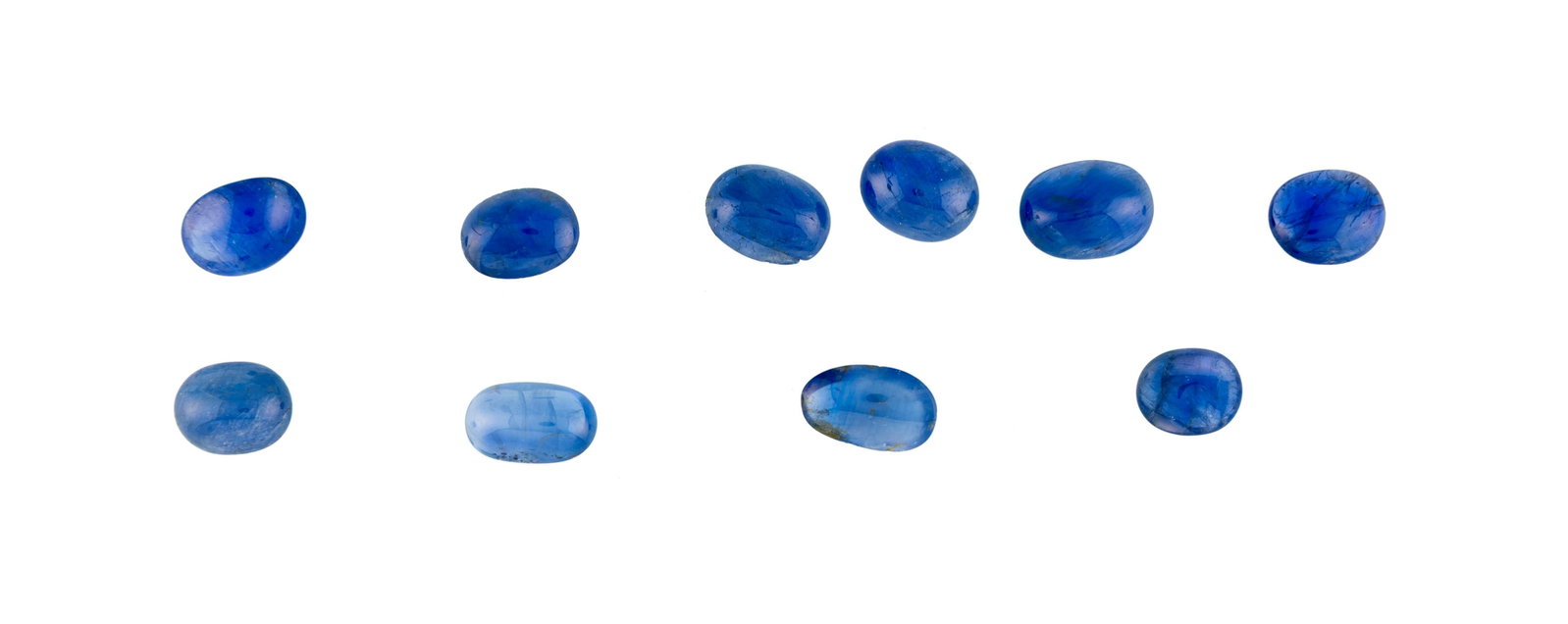Lot de 8 plis de saphirs sur papier taille cabochon ou polis pour un total d'environ 120 carats: Lot de 8 plis de saphirs sur papier taille cabochon ou polis pour un total d'environ 120 carats