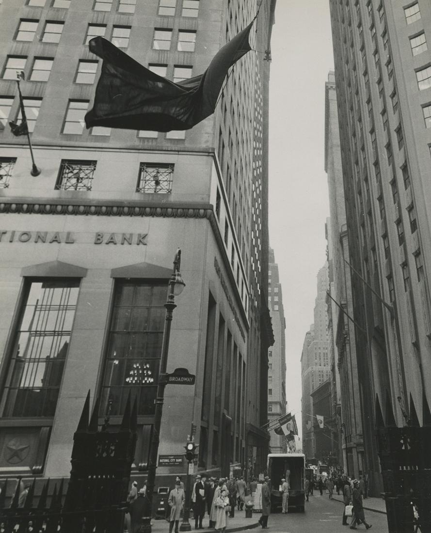 Berenice Abbott, New York, 1958: Berenice Abbott, Looking down Wall Street from Trinity Church, New York, 1958. gelatin silver print, 10 x 8 inches. Photographer's credit stamp on the print verso. Condition is excellent, less very sl