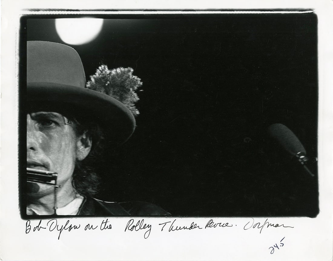 Elsa Dorfman, Bob Dylan, 1975: Elsa Dorfman, Bob Dylan on the Rolling Thunder Revue, Lowell, MA, 1975. vintage gelatin silver print, 11 x 14 inches. Signed on the print recto. Condition is very good, minor handling creases at top m