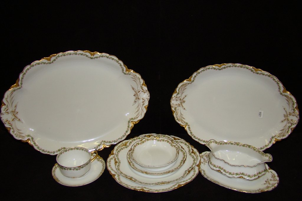 82 pcs. of Haviland china, Cloverleaf pattern, serv: service for 12 plus 10 serving pieces incl. platters, covered vegetable bowls and more, Schleiger No. 98