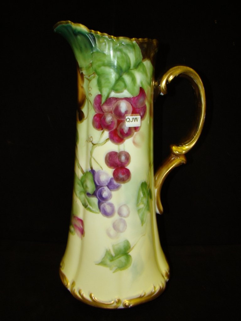 Hand-painted French china tankard, approx. 15 1/2" : approx. 15 1/2" high decorated with grapes, signed and dated 1905