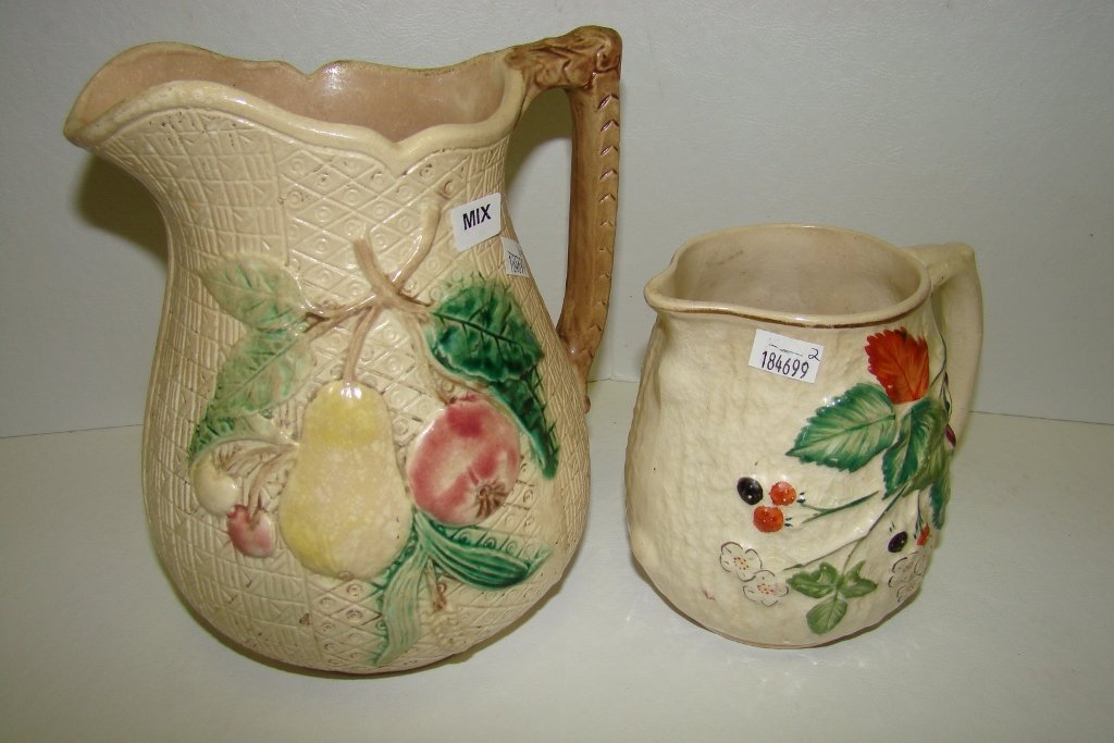 an 8" Majolica fruit pitcher and a 5" Majolica berr: berries pitcher