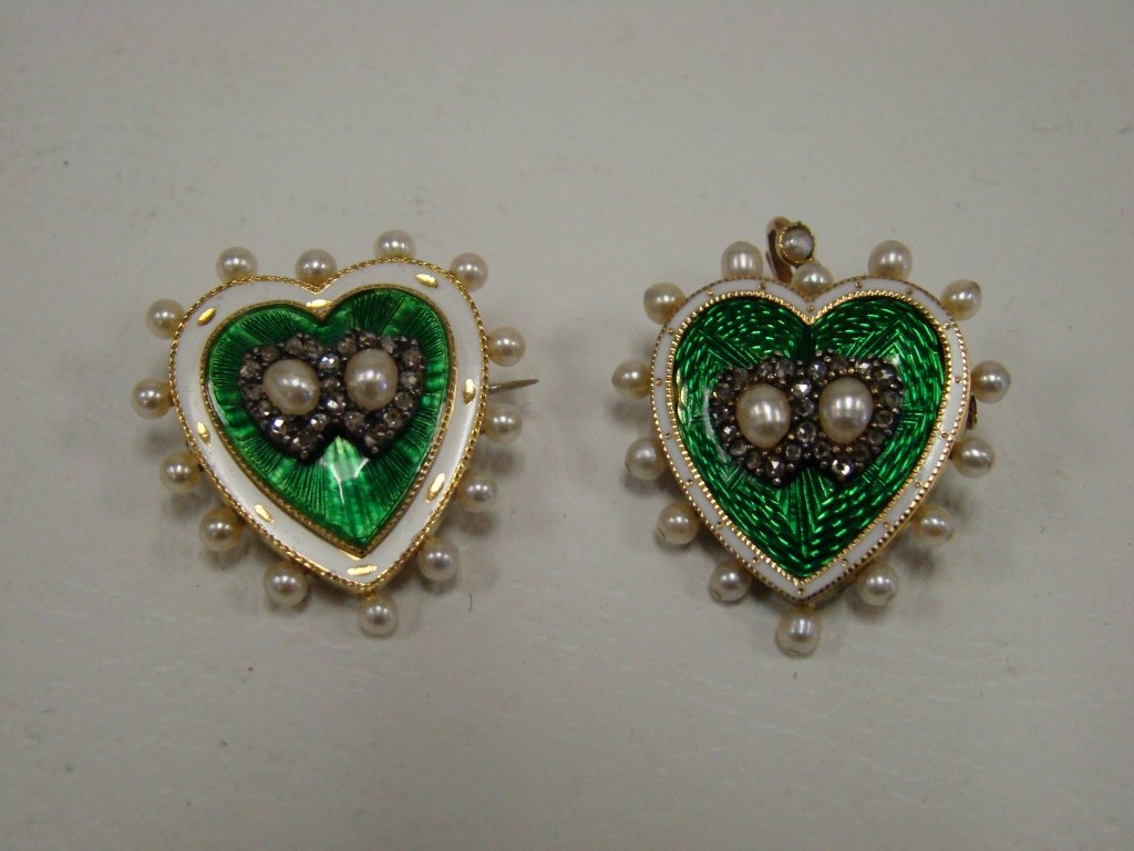 A pair of green and white enameled heart-shaped pi: pins/pendants with pearls, on unmarked but tested 14kt yellow gold frames, one with framed portrait on reverse