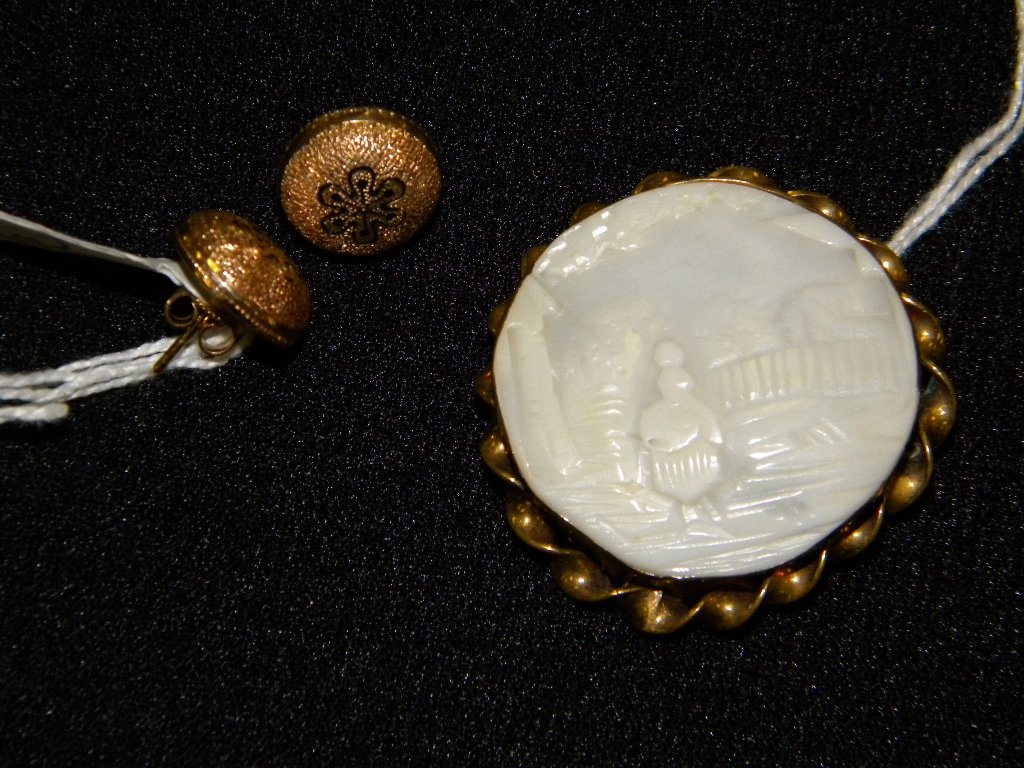 A gold-filled shell cameo brooch, Rebecca at the W: Well; and gold-filled cufflinks with black enameling made into earrings