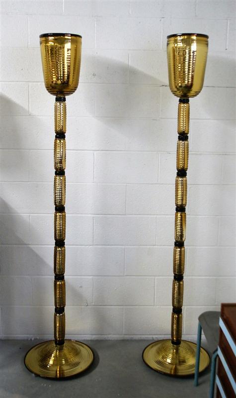 Glass Torchieres by Dona: Pair of Studio Made Glass Torchieres by DonaBrilliant gold-glass elements. Reflective surfaces, and a single Edison sized socket in each light. Hand made in Murano by Dona Excellent condition with new