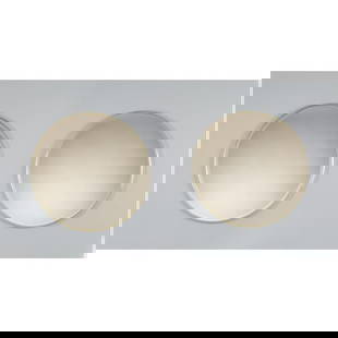 N. VALSECCHI Pair Mirrors: Nucci Valsecchi -Attributable Production Italy 1970 ca. Pair of wall mirrors, smoky mirrored glass, circular body, brass frame. cm Ø 75. Diameter: 29.53" / 75cm Quantity: 2