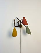 Vintage wall lamp with three lights, Italy, 1950: The fixture features a central mounting point from which three arms extend, each topped with a distinct, colored, dish-shaped shade: one green, one red, and one yellow.