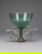 Pino Signoretto Sculptural Table Lamp in murano glass, c.1970: Pino Signoretto and Franca Petroli Murano glass sculpture-lampearly 1980s. Central cup supported by two transparent glass figures, it has a light, and the designers' pointed signature is at the base