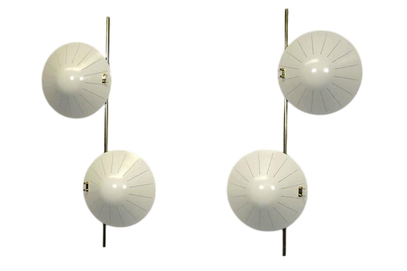 Pair of Italian Sconces: A wonderful pair Limited Edition of sconces made in Italy, reminiscent of the early 1950s designs that are ubiquitous to the Italian design market of the Mid-Century era. Shades are Cream/Ivory Color