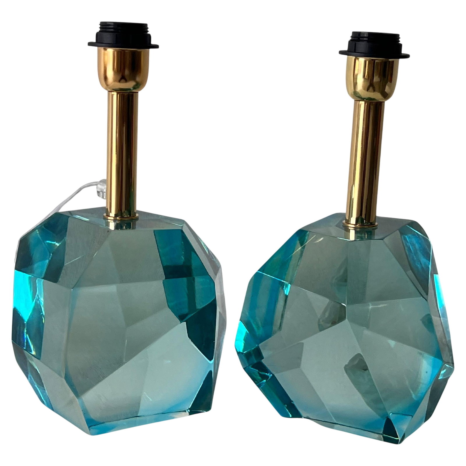 Glass "Rock" Aquamarine Table Lamps: Murano glass aquamarine rock table lamps signed by Alberto Dona. Made by hand in Murano, Italy. These lamps are the perfect blend of modern design and classic elegance. The smoky, faceted glass base c