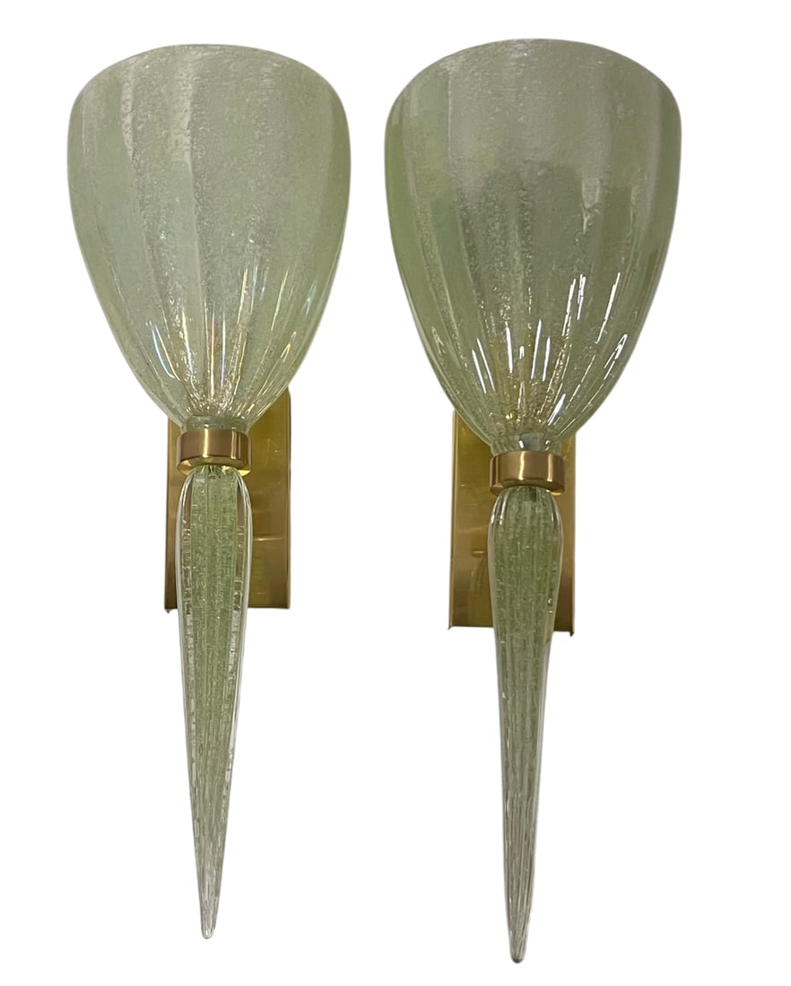 Murano Glass Sconces by Alberto Dona: Large Hand-Blown Murano Glass Sconces by master glassmaker Alberto Dona The pale green textured glass and brass accents create a warm, inviting ambiance.