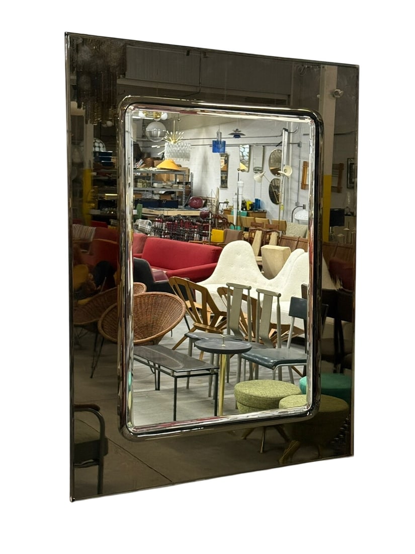 Italian Chromed Frame Mirror: Italian Mid-Century Modern Chrome-Framed Mirror dating back to the circa 1970s Space Age design movement. Attributed to Fontana Arte