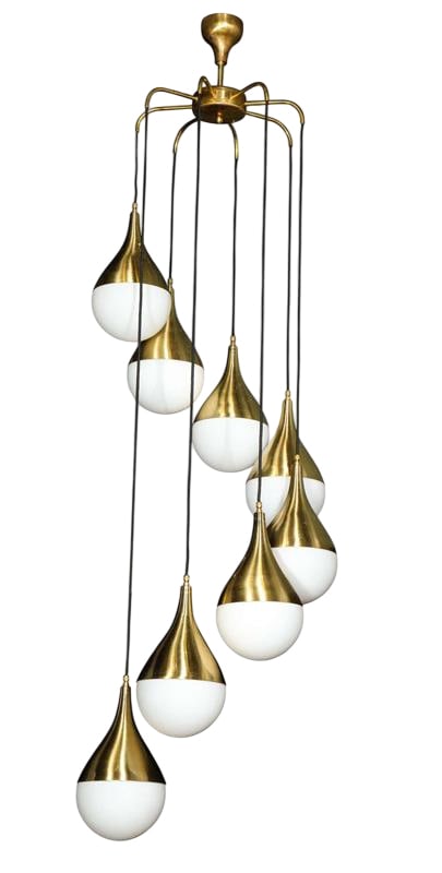 Large Cascading Stilnovo Style: Grand scale of 6 feet (Adjustable) cascading chandeliers in the style of Stilnovo with eight teardrop shaped brass and opaline glass lights. Not UL Certified May need rewired