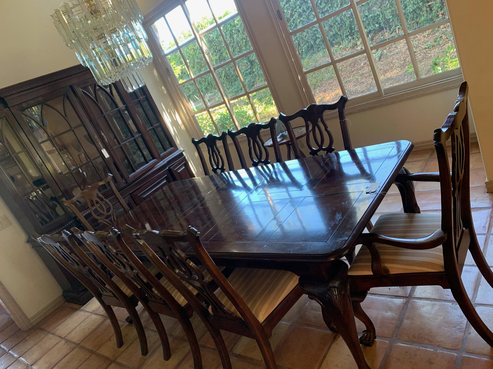 Fabulous mohogany dining table set: Mohogany table with 4 leafs and 12 chair; minor damage on the top; see picture; Dimension with 1 leaf: 91"x43.25" ; with 4 leafs in total; each leaf: 19.25" x 43.25;chairs with minor scratches; see pi