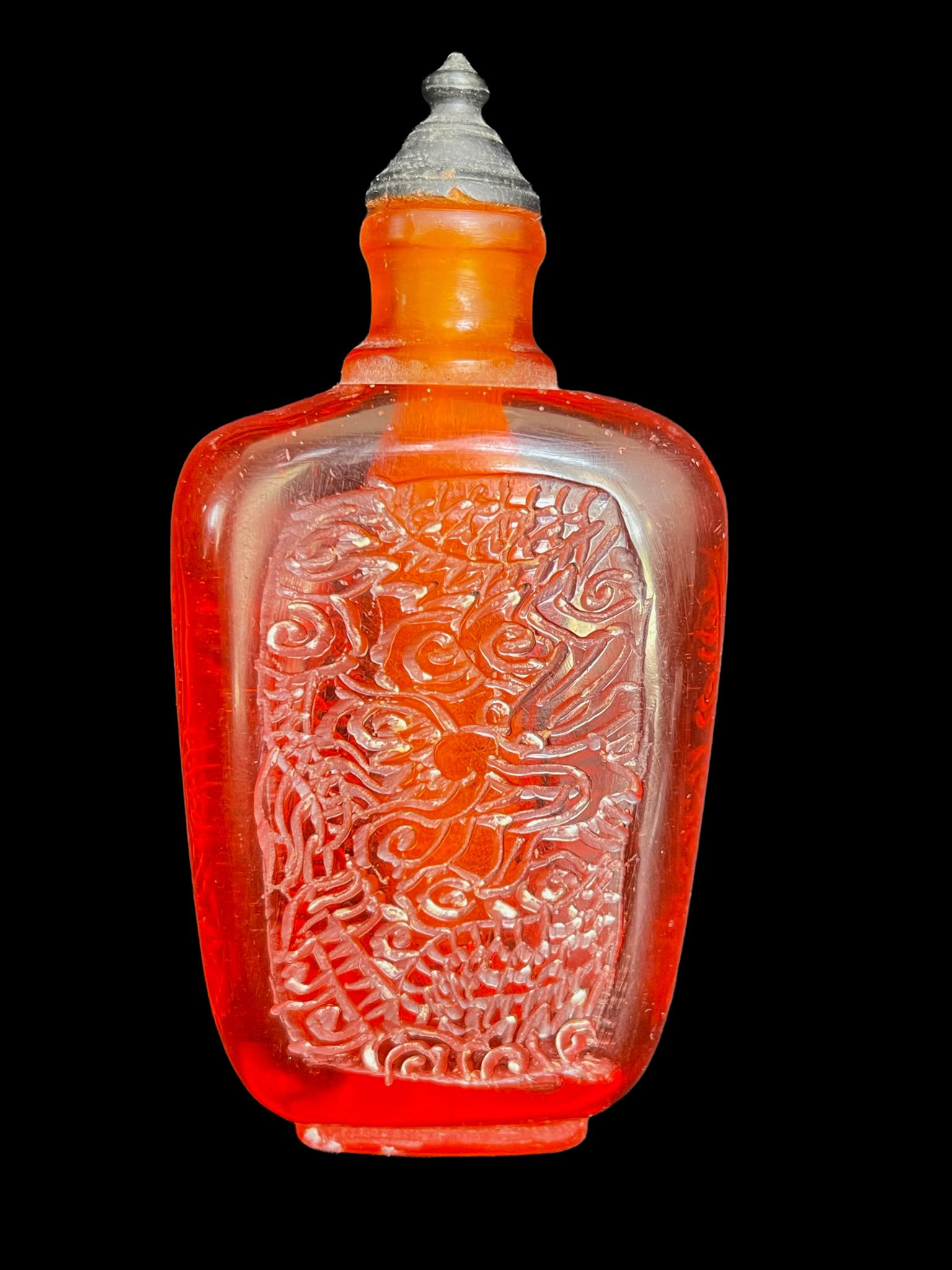 Chinese red peking glass with dragon carved snuff bottle: Chinese red peking glass with dragon carved snuff bottle; cm: 13H