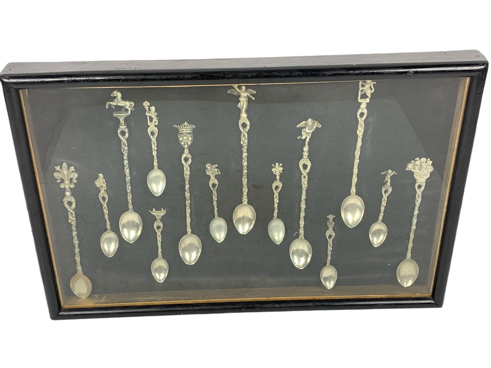 A set of sterling silver spoons with frame (1 of 14)